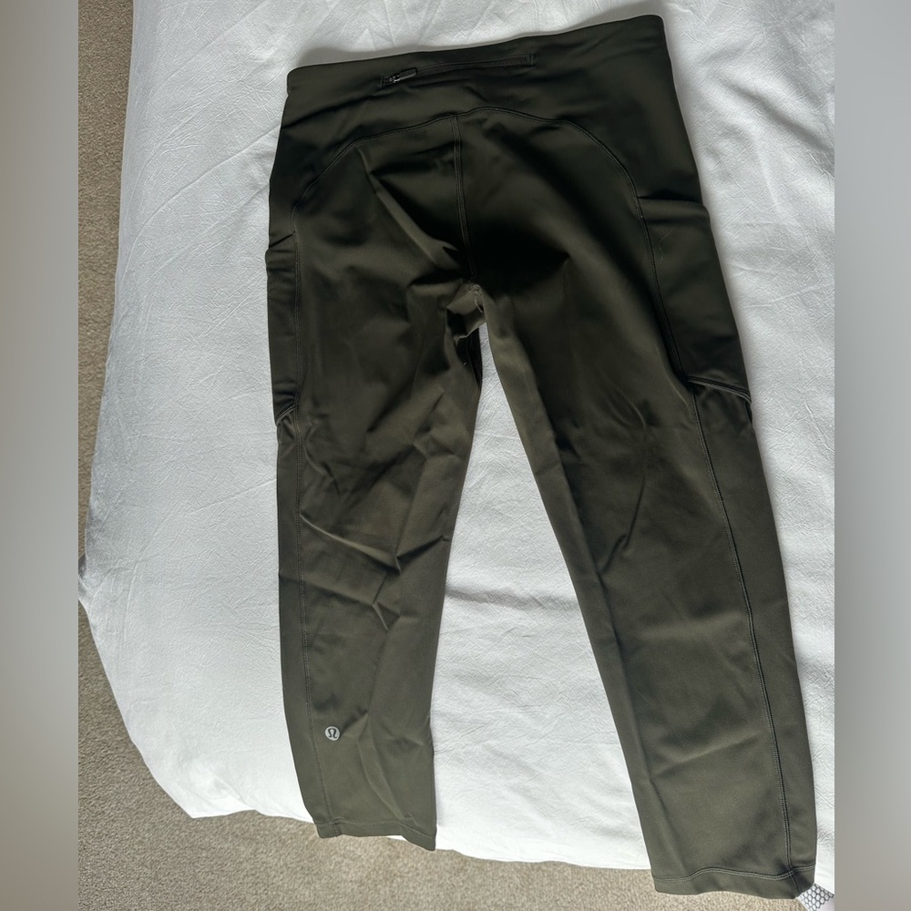 Olive green Lululemon Fast and Free leggings.